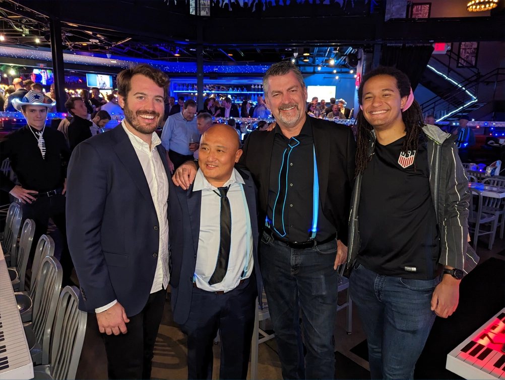 Corporate guests in front of the stage at a Bobby McKey's private event