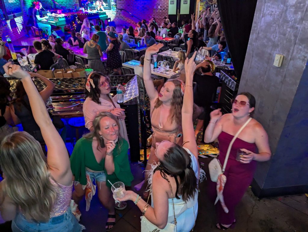 Crowd dancing in front of the stage at Bobby McKey's