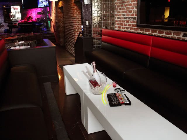 Bobby's Hangout private booth section with bottle service table